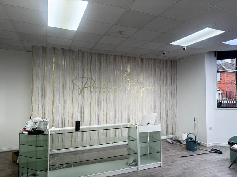 An image of the interior signage for Pearls and Petals.